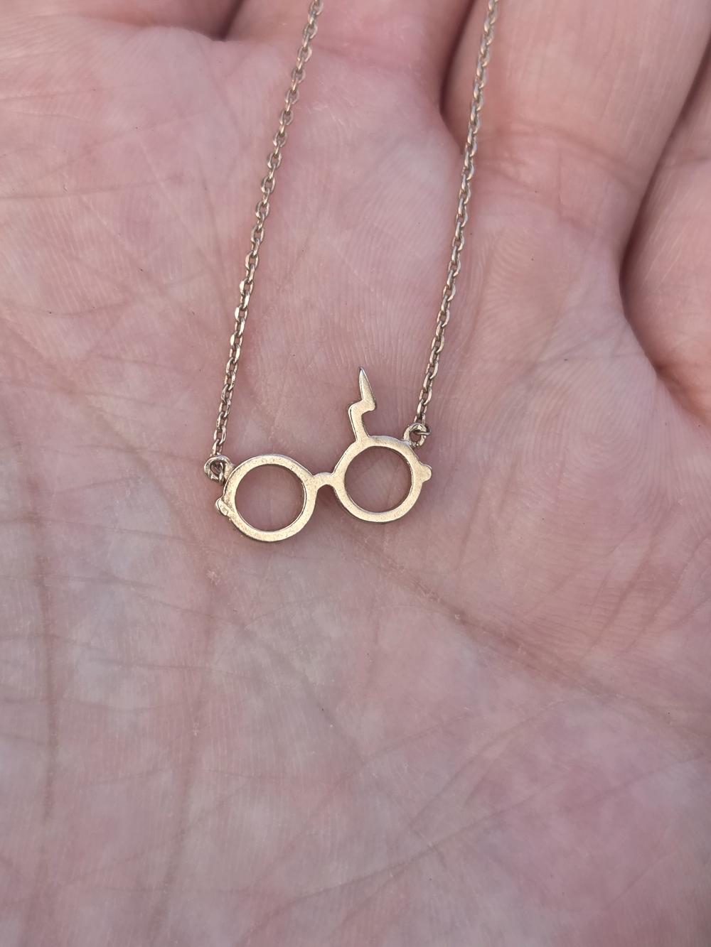 Gold-Tone Lightning Bolt Glasses Pendant Necklace
